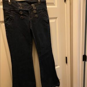 Wide leg dark wash flare bell bottom button up jeans. High waisted. Sailor fit